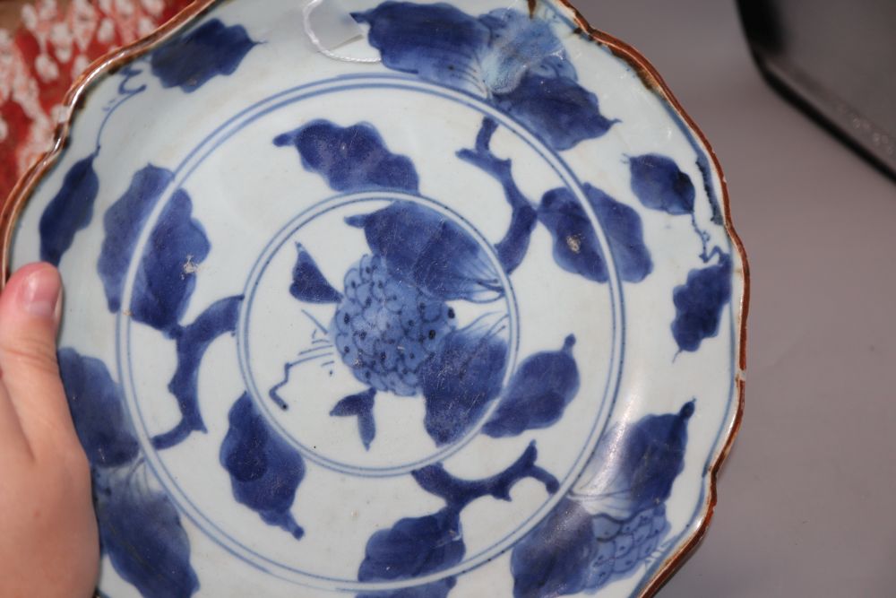 An 18th century Japanese blue and white dish, a studio vase and a Kutani plate and tea bowl and saucer, tallest 20cm